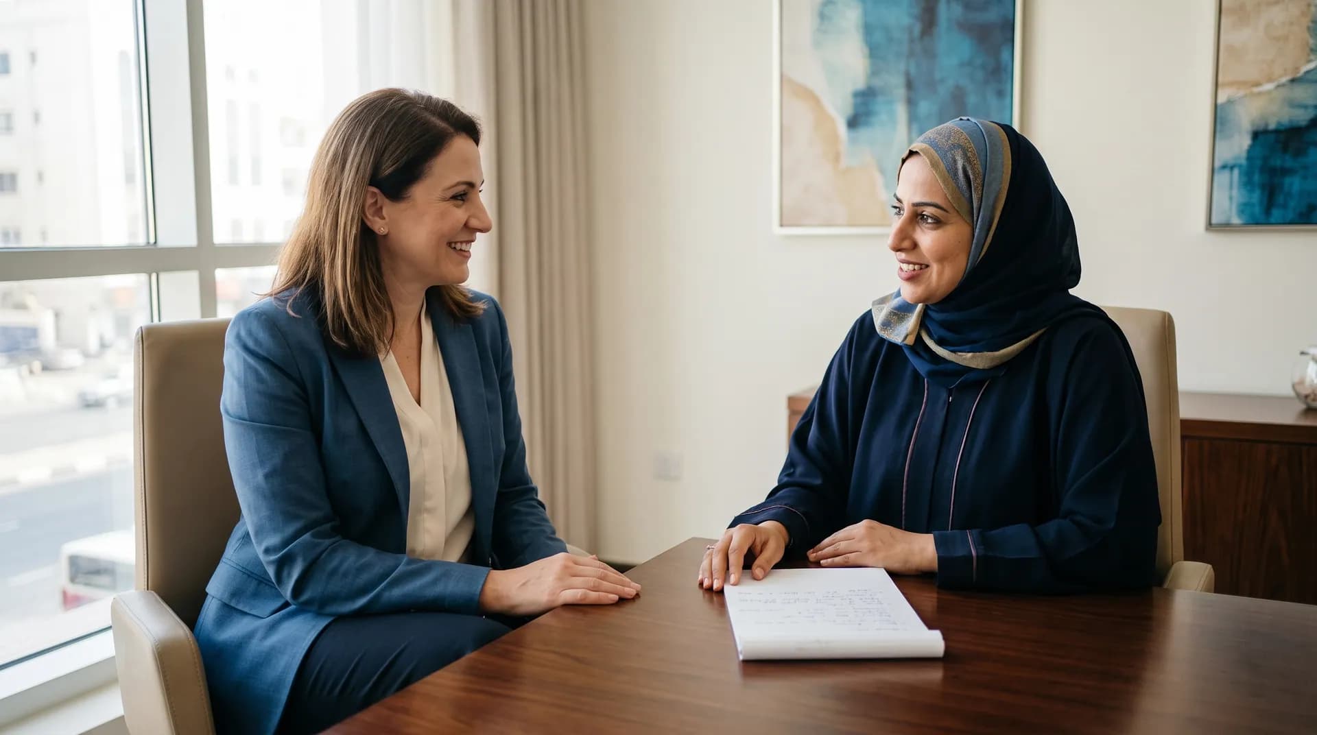 An Omani woman asking questions during a balanced consultation.